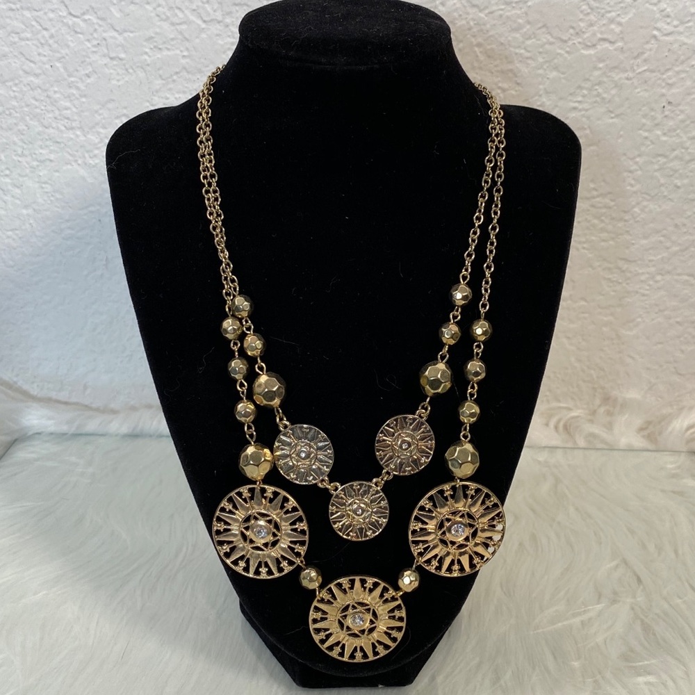 Goldtone double necklace with rhinestones in round